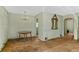 Classic dining room with hardwood floors and a chandelier at 1435 Quebec St, Denver, CO 80220