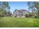 Lush backyard with a beautiful home exterior is perfect for relaxing and entertaining at 2215 Parkview Dr, Longmont, CO 80504