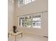 Bright foyer area with a large window providing natural light, complemented by neutral decor at 2215 Parkview Dr, Longmont, CO 80504