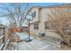 Backyard exterior of home featuring a basketball hoop and side yard at 710 Kittredge St, Aurora, CO 80011