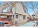 Backyard exterior of home featuring a covered patio and access to outdoor space at 710 Kittredge St, Aurora, CO 80011