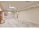 Spacious basement featuring neutral carpet, a fireplace, and recessed lighting providing a cozy atmosphere at 710 Kittredge St, Aurora, CO 80011