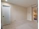 Neutral bedroom with a closet and a view to the hallway at 710 Kittredge St, Aurora, CO 80011