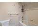 Shower with white subway tile, shower head and in-shower caddy at 710 Kittredge St, Aurora, CO 80011