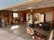 Garage with various storage items, including a motorcycle and lawnmower at 4922 Meade St, Denver, CO 80221