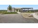 View of the community clubhouse with pool and fitness center access with mountain view and greenery at 853 Jenny Ln, Berthoud, CO 80513