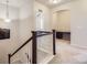 Hallway with desk and chair space leading to a bedroom at 853 Jenny Ln, Berthoud, CO 80513