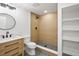 Modern bathroom featuring a stylish vanity, tiled shower, and contemporary fixtures at 5569 Willow Springs Dr, Morrison, CO 80465