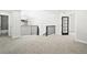 Bonus room features stylish wrought iron railings, and ample room for furniture at 5569 Willow Springs Dr, Morrison, CO 80465