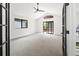 Bonus room featuring high ceilings, access to the deck, and lots of natural light at 5569 Willow Springs Dr, Morrison, CO 80465