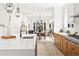Spacious kitchen with white counter tops with an open layout and dining space at 5569 Willow Springs Dr, Morrison, CO 80465