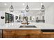 Spacious kitchen featuring quartz counters and stainless steel appliances with an open floor plan at 5569 Willow Springs Dr, Morrison, CO 80465