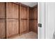 Spacious walk-in closet featuring custom wood organizers and ample storage space at 5569 Willow Springs Dr, Morrison, CO 80465