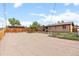 Expansive backyard with plenty of parking space and a secure fenced perimeter at 7961 Granada Rd, Denver, CO 80221