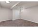 This bedroom offers a blank canvas with neutral carpet and closet at 7961 Granada Rd, Denver, CO 80221