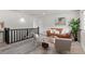 Bright living area with stylish furnishings, a cozy leather sofa, and elegant decor throughout at 7961 Granada Rd, Denver, CO 80221