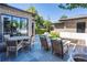 Back patio with outdoor dining area and built-in seating, perfect for entertaining at 2409 S Fillmore St, Denver, CO 80210