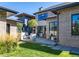Spacious backyard featuring mature trees, privacy landscaping and outdoor dining area at 2409 S Fillmore St, Denver, CO 80210