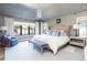 Tranquil main bedroom featuring textured wall coverings, and modern lighting at 2409 S Fillmore St, Denver, CO 80210