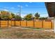Spacious backyard with a wooden fence and potential for outdoor entertaining and recreation at 3220 W 8Th Ave, Denver, CO 80204