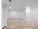 Finished basement with neutral carpet and paint, offers a clean, open space for flexible use at 3220 W 8Th Ave, Denver, CO 80204