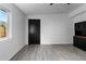 This bedroom features modern flooring, white walls, natural light, and built in storage cabinets at 3220 W 8Th Ave, Denver, CO 80204