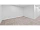 Neutral carpet bedroom features white walls and white trim at 3220 W 8Th Ave, Denver, CO 80204