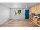 Bright and airy living room with a modern fireplace and large window at 3220 W 8Th Ave, Denver, CO 80204