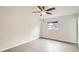 Bright bedroom showcasing hardwood floors and a ceiling fan fixture at 3235 S Newland St, Denver, CO 80227