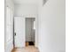 Hallway with a view to a sunny, adjacent room at 3346 W 30Th Ave, Denver, CO 80211