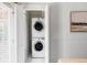 Convenient laundry area featuring a stacked washer and dryer, maximizing space and efficiency at 3346 W 30Th Ave, Denver, CO 80211