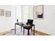 Bright office space with modern decor, a stylish desk, and a cozy rug on hardwood floors at 3346 W 30Th Ave, Denver, CO 80211