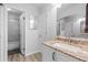 Bathroom featuring granite countertops and modern fixtures at 8462 Everett Way # B, Arvada, CO 80005