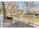 Cozy front porch with stylish railing, perfect for enjoying neighborhood views and relaxing outdoors at 8462 Everett Way # B, Arvada, CO 80005