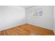 Bright bedroom with natural light, hard wood floors and a door with a closet at 2166 S Golden Ct, Denver, CO 80227