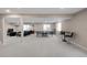 Finished basement with space for entertaining, recreation, and relaxing at 13664 Cherry St, Thornton, CO 80602