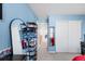 Bedroom featuring closet with sliding doors and shoe rack with multiple shelves at 13664 Cherry St, Thornton, CO 80602