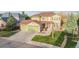 Charming two-story home boasts a three-car garage, beautiful lawn, and mature trees at 13664 Cherry St, Thornton, CO 80602