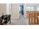 Upper hallway with a dark wood console at 13664 Cherry St, Thornton, CO 80602
