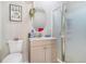 Cozy bathroom featuring a modern shower, toilet, and sink with neutral color creating a relaxing atmosphere at 525 Willow Dr, Brighton, CO 80603