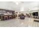 Bright, open-concept living room featuring modern flooring, stylish furniture, and abundant natural light at 525 Willow Dr, Brighton, CO 80603