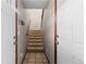 Inviting entryway featuring tiled floors, staircase, and access to the main living areas at 9792 Mayfair St # F, Englewood, CO 80112