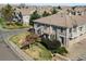 Beautiful two-story townhome featuring stone accents, manicured lawn and low maintenance landscaping at 9792 Mayfair St # F, Englewood, CO 80112