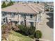 Charming two-story home with a cozy front entrance and well-maintained landscaping, perfect for Gathering living at 9792 Mayfair St # F, Englewood, CO 80112