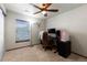 Functional office space with a comfortable chair, computer setup, and natural light, perfect for productivity at 9792 Mayfair St # F, Englewood, CO 80112