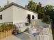 Relaxing rooftop patio with comfortable seating, modern design, and privacy fence at 2417 S Lafayette St, Denver, CO 80210
