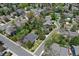 Residential area aerial view featuring mature trees, well-kept lawns, and neighborhood street layout at 7295 S Steele Cir, Centennial, CO 80122
