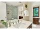 Elegant bathroom vanity featuring marble countertop and upgraded shower at 7295 S Steele Cir, Centennial, CO 80122