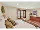 Bright bedroom with recessed lighting, wood trim window, and elegant furnishings at 7295 S Steele Cir, Centennial, CO 80122