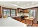 Spacious kitchen featuring stainless steel appliances, ample counter space, and natural lighting at 7295 S Steele Cir, Centennial, CO 80122